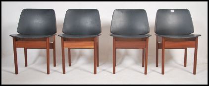 A good set of 4 1970's EON teak wood and faux blac