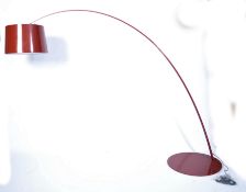 A large oversized twiggy floor lamp in the manner