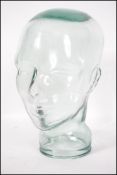 A 20th century moulded pressed glass phrenology ty