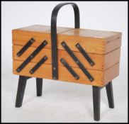 A good 1950's metamorphic sewing box ebonised hand