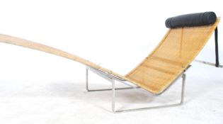 After Poul Kjærholm. A  chaise longue lounger mode