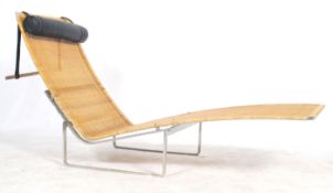 After Poul Kjærholm. A  chaise longue lounger mode
