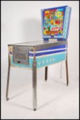 A 1967's Gottlieb Melody pinball machine. Four kic