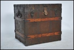 A late 19th Century iron-mounted, wooden bound can