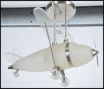 A contemporary frosted glass ceiling light in the