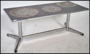 A good 1970's Danish retro chrome and tile top cof