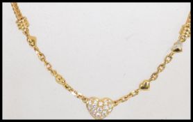 An 18ct gold and diamond choker necklace having an