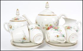 A believed 19th century porcelain tea service bear