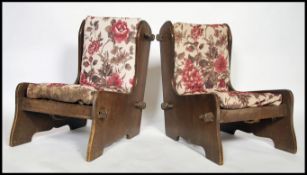 A mid century Arts & Crafts oak sofa and pair of a