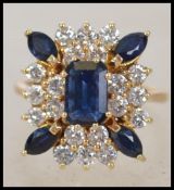 A stunning Art Deco 25 stone Sapphire and Diamond