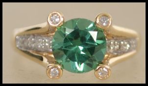 A 14ct yellow gold, tourmaline and diamond ladies