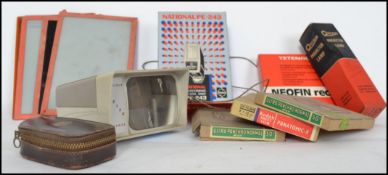 A collection of vintage camera accessories to incl