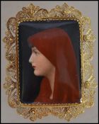 A 19th century / 20th century hand painted brooch