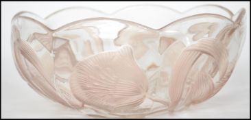 A 1920's pressed iridescent glass fruit bowl in th