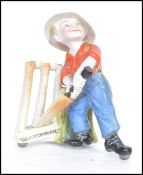 A rare early 20th century Kinsella ceramic figurin