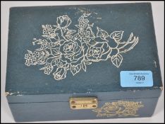 A vintage musical jewellery box containing a good