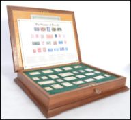 A good cased set of twenty-five .925 silver stamps