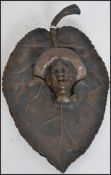 An unusual 20th century American bronze wall sculp