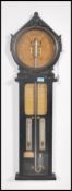 A carved oak Royal Polytechnic Barometer Joseph Da