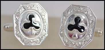 A pair of contemporary silver and enamel set gentl