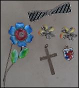 A collection of silver and white metal items to in