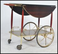 A retro 20th century lacquered Mahogany two tier d