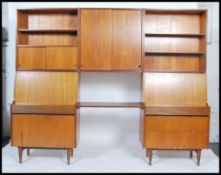 A stunning 1960's teak wood modular wall system in