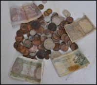 A collection of coinage and notes / money dating f