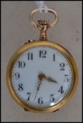 A vintage 18ct gold miniature pocket watch having