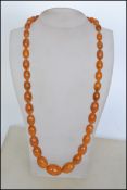 A vintage 20th century  amberite beaded necklace w