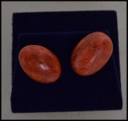 A pair of silver and apple coral ladies earrings c