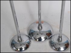 A set of three 1930s Art Deco chrome wig stands ra