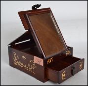 A vintage 20th century Chinese hard wood portable