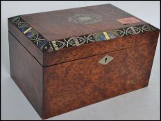 A 19th century Regency yew wood and abalone tea ca