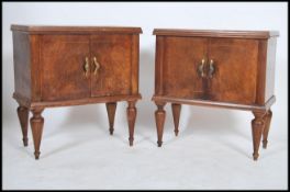 A pair of early 20th century Italian walnut bedsid