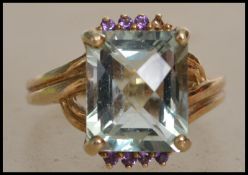 A hallmarked 9ct gold ring set with a large facete