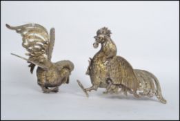 A 20th century pair of good silver plate fighting