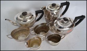 An early 20th century silver plate 4 piece tea and