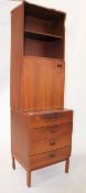 A 1970's Danish teak upright pedestal chest of dra