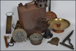 A mixed lot of vintage metal ware to include a vintage Shell petrol can, industrial gauge, scales,
