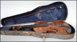 A vintage 20th century cased violin, the Violin having an applied makers label for The London Violin