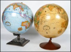A pair of retro 20th century terrestrial globes, b