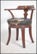 A Victorian solid mahogany Industrial swivel chair / desk armchair. Raised on a quadruped base