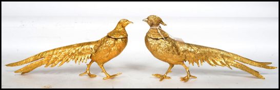 A stunning pair / brace of European cast gilt meta