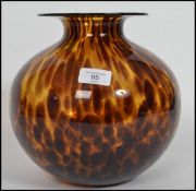 A 1930s Art Deco studio glass baluster vase in a tortoise shell colourway having a tapering neck