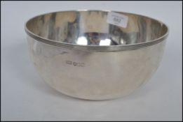 A late Victorian deep silver hallmarked silver bowl of simple form, bearing makers mark for Rowlands