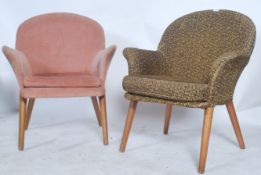 A good pair of mid century armchairs in the manner of Parker Knoll. Each raised on tapering legs