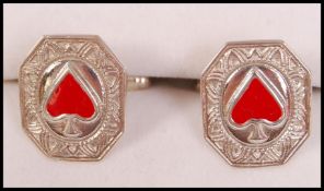 A pair of gents 20th century silver and enamel set cuff links / cufflinks. Each with enamel set