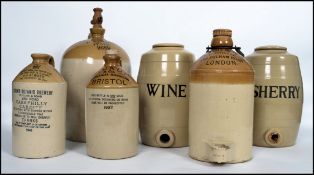 A good collection of vintage stoneware advertising jugs/flagons to include local interest, Bristol