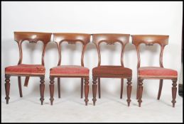 A good set of 4 Regency mahogany bar back dining chairs being raised on tapering legs having